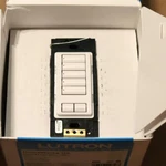 One Lutron Homeworks Qs HQRD-W5BRL-WH White Button Raise Lower Switch. Fixed Price $309.45.