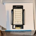 One Lutron Homeworks Qs HQRD-W5BRL-LA Light Almond Button Raise Lower Switch. Fixed Price $338.54.
