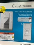 Lutron Caseta P-PKG1P-WH Wireless Smart Lighting Lamp Dimmer & Remote Kit 8222O. Fixed Price $44.00.